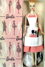 a barbie doll is in a box with its contents