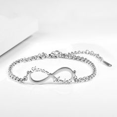 The Infinity Two Name Bracelet has love written all over it! This special bracelet features two names: husband and wife, mother and child, boyfriend and girlfriend, father and child, siblings or even best friends! The names on each side of the infinity icon truly symbolizes the bond formed between the two being forever. Gift this bracelet to the special person in your life whom you can't see a life without! This bracelet makes an affectionate gift as it shows the recipient how much they mean to Nameplate Bracelet, English Jewelry, Boyfriend And Girlfriend, Custom Bracelet, Couple Bracelets, The Infinity, Name Bracelet, Anklet Bracelet, Custom Bracelets