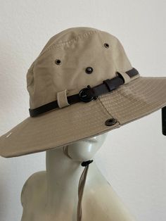 The Lord liveth; and blessed be my rock; and let the God of my salvation be exalted.. PSALM 18:46 FEATURES New with tags.  Hat features vents, side button snaps, faux leather band and adjustable chin cord. FLAWS N/A BRAND Westend COLOR Khaki/Tan SHELL FABRIC/MATERIAL 100% Cotton SIZE S/M For reduce cost shipping, items will wrinkle in transit. Environment My home is smoke free and pet free.  I sell items from my closet, as well as items purchased from thrift stores and retails store.  For thrift Adjustable Brown Hat For Adventure, Adjustable Country Hat Bands For Outdoor Activities, Casual Outdoor Hats With Adjustable Strap, Safari Costume, Safari Hat, Blessed Be, My Rock, Diy Hat, Safari Style