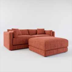 an orange couch and ottoman on a white background