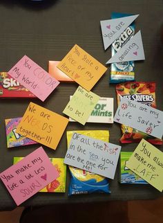 a table topped with lots of post it notes