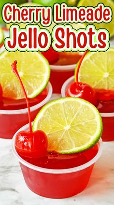 cherry limeade jello shots in plastic cups with cherries