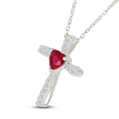 Your faith shines bright in this shimmering cross necklace. Sterling silver A heart-shaped lab-created ruby centers the pendant Graduated sizes of round white lab-created sapphires line the looped arms 18-inch cable chain with lobster clasp Sterling Silver Cross Necklace For Valentine's Day, Sterling Silver Cross Pendant Jewelry For Valentine's Day, Cross-shaped Jewelry For Valentine's Day Anniversary, Red Cross Necklace For Valentine's Day, Valentine's Day Cross Jewelry For Anniversary, Valentine's Day Cross Shaped Jewelry For Anniversary, Sterling Silver Cross Necklace, Jared The Galleria Of Jewelry, White Lab