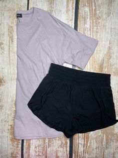 Soft athletic shorts Wide waist band Built in underwear side split