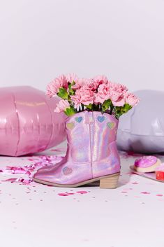 Description: Step out in style with these Pink Iridescent Heart Cowgirl Boots, designed to bring a touch of sparkle to any outfit. These boots feature vibrant iridescent hearts against a pink background, perfect for making a bold fashion statement. Ideal for both casual and dressy occasions, these boots offer a fun twist on traditional cowgirl footwear. PLEASE NOTE - SIZING ONE FULL SIZE UP IS RECOMMENDED Material & Care: Material: High-quality synthetic material with iridescent heart embellishm Heart Cowgirl Boots, Traditional Cowgirl, Crystal Hoodie, Pink Cowgirl Boots, Flower Sweater, Watercolor Sky, Pink Iridescent, Pink Cowgirl, Rainbow Sweater