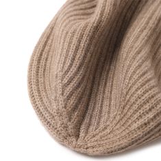 This eye-catching classically knitted cashmere hat is a chic addition to your outfit that will give you a fashionable look. Cashmere is a soft, luxurious material that can make the wearer feel beautiful and confident. However, if the garment is not pure cashmere, it can be itchy and uncomfortable. We use only the premium quality hand-loomed cashmere for our ready-to-wear collections and ensure that our hats are super comfortable to wear and do not feel itchy. Gentle hand-wash using delicate dete Classic Cashmere Winter Hat, Classic Soft Knit Hat For Fall, Knitted Cashmere Beanie Hat, Cozy Cashmere Soft Knit Hat, Casual Cashmere Soft Knit Hat, Classic Cashmere Soft Knit Hat, Cashmere Soft Knit Beanie, Cozy Cashmere Beanie Hat, Elegant Knitted Hats For Winter