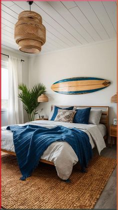 a bedroom with a surfboard hanging above the bed