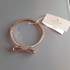 Kate Spade Rose Gold Plated Clasp Bangle With Original Tag Attached, Playful And Chic Makes A Lovely Gift. Originally Retails $78 Elegant Metal Bracelets By Kate Spade, Kate Spade Bangle Jewelry For Gift, Chic Kate Spade Gold Bracelets, Kate Spade Gold Bracelet Jewelry, Elegant Kate Spade Metal Bracelets, Kate Spade Elegant Bangle Jewelry, Kate Spade Gold Bangle, Kate Spade Bracelet, Kate Spade Bangle