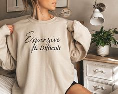 Expensive And Difficult Sweatshirt, Expensive And Difficult Hoodie, Funny Sweatshirt, Mom Sweatshirt, Funny Hoodie, Wife Sweatshirt CAUTION: For security reasons, there is no rope in the throat area for youth hoodie. Hello!! Dear Customer, We're here to give you best Funny sweatshirt, hoodie and crewneck options for you. We want to make everyone smile with our cute , stylish and trendy graphic T-shirts. We can assured you this shirt will be perfect Funny sweatshirt, hoodie and crewneck gift whet V Neck Shirts, Future Mrs, Gymnast, Look Plus, Shiba Inu, Our Lady, Sweatshirt Hoodie, Namaste, Dog Mom