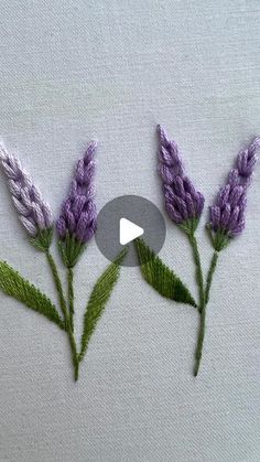 the video is showing how to make lavender flowers