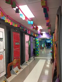 the hallway is decorated with colorful paper decorations