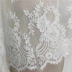 Beautiful Soft Eyelash French lace fabric This is a new style in high quality. It with Scalloped on both sides Great for make wedding dress, evening gown, Costume, cocktail dress Color: White Width - 59 inches, Length - 118 inches (3yards) This Listing Fabric is 3 yards Length It is fabric product, not include dress Wholesale acceptable, please convo me Shipping Time: United Sates: 10-15 working days United Kingdom:10-15 working days Canada: 10-15working days Australia: 10-15 working days Asia:4 Off White Lace Trim Wedding Dress, Off White Lace Dress For Wedding, Cream Lace Dress With Lace Back, Lace Dress With Lace Patchwork For Wedding, Cream Lace Dress With Delicate Details, Lace Wedding Dress With Lace Patchwork, Off White Lace With Lace Trim For Wedding, Cream Lace Dress With Scalloped Details, Wedding Lace Dress With Lace Back