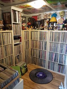 a room filled with lots of records and cds