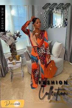 Leopard Printed Deep V Long Jumpsuit Orange V-neck Jumpsuit For Party, Orange V-neck Jumpsuits And Rompers For Party, Chic Orange Long Sleeve Jumpsuits And Rompers, Long Sleeve Jumpsuits And Rompers For Fall Vacation, Chic Orange Long Sleeve Jumpsuit, Orange Long Sleeve Jumpsuits And Rompers For Summer, Long Jumpsuits, Deep V, Leopard Print