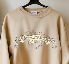 A legendary phrase from the wizarding world. The best gift for true wizard fans. A unisex heavy blend crewneck sweatshirt is pure comfort.  Made with a medium-heavy fabric blend of 50% cotton and 50% polyester. The collar is ribbed knit, so it retains its shape even after washing.  There are no itchy side seams on these sweaters.  The classic fit along with the crew neckline. HOW TO ORDER * Choose your shirt color * Choose your size CARE INSTRUCTIONS For the best and lasting results: Turn inside Harry Potter Hoodie Design, Harry Potter Clothes, Harry Potter Gift Ideas, Harry Potter Hoodie, Harry Potter Sweatshirt, Harry Potter Gifts, Trending Today, Text Design, Shirt Outfit