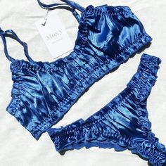 This stunning blue silk lingerie set is the perfect gift for your best friend (and for yourself too!). Made with 95% organic silk, the bralette and panty are comfortable and breathable to keep you cool in the summer months. We've chosen an exclusive, limited edition shade of ocean blue to add a touch of luxury and glamour. The high-waisted bikini cut of the panty creates a sexy, striking silhouette. Enjoy a luxurious summer with this beautiful lingerie set! Satin Panty, Silk Bralette, Fashion District Los Angeles, Lime Yellow, Blue Lingerie, Silk Lingerie, Pink Lingerie, Swim Suits, Island Beach