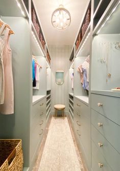 a walk in closet filled with lots of drawers