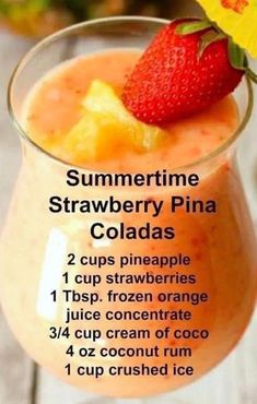 a close up of a drink in a glass with strawberries on top and text describing the ingredients