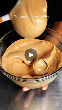 a person is mixing peanut butter in a bowl