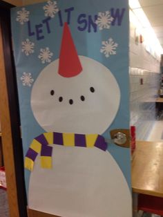 a classroom door decorated with a snowman