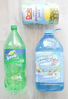 two bottles of water, one with hawaiian punch and the other with sprite on it