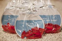 two clear bags filled with red rose petals