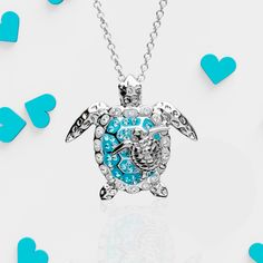 This beautiful pendant features a baby turtle resting on its mother's shell, showcasing the happiness of being together. With every purchase, you will not only own a stunning piece of jewelry, but also adopt and save your own sea turtle. Make a difference with your fashion choices and order now! Personalized Ocean-inspired Jewelry Gift, Ocean-inspired Pendant Charm Necklace As Gift, Ocean-inspired Jewelry With Round Pendant For Gift, Ocean-inspired Round Pendant Jewelry For Gift, Ocean-inspired Round Pendant Jewelry Gift, Silver Turtle Jewelry For Gifts, Silver Turtle Jewelry Gift, Turtle Shaped Sterling Silver Jewelry Gift, Sterling Silver Turtle Jewelry Gift