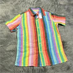 Up For Sale Is A Boys Shirt By Gap Kids. Tagged Size Small 6/7. New With Tag. Rainbow Multicolored Striped Button Up. Colors Are A Bit More Faded Looking In Person Than Shown In Photos, Which Are Taken In Studio Lighting And Can Appear Brighter On Screens. Kids Rainbow, Boys Shirt, Rainbow Kids, Striped Short, Gap Kids, Studio Lighting, Short Sleeve Button Up, Rainbow Stripes, Boys Shirts