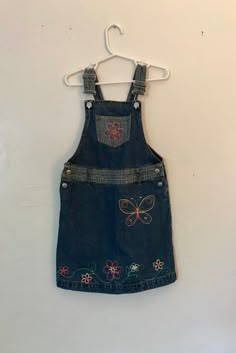 "Beautiful Retro Altered Couture Hippie Look denim blue jean jumper dress , overalls, Dungarees  Bright colorful embroidery Embellishments butterflies and flowers  Adjustable shoulder straps with metal buttons and buckles  Metal button side closures  3 Pockets  Festival Clothing  Talbots Kids Size 5 100% Cotton  Measures when laid flat  Chest 12\" (24) Length from armpit 14\" Very good vintage condition  Smoke Free Studio" 2000s Kids Clothes, Denim Jumper Outfit, Nostalgia Clothing, Dress Overalls, Blue Shirt With Jeans, Denim Jumper Dress, Vintage Kids Clothes, Embroidery Embellishments, Jean Jumper