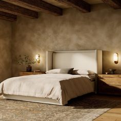 a bedroom with a bed, nightstands and two lamps on the side of the wall