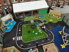 an overhead view of a play area with children playing