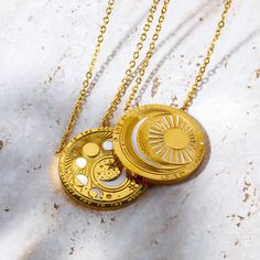 Our Celestial Coin Medallion Necklace—a captivating accessory inspired by the celestial wonders of the universe. This necklace features a stunning coin-shaped pendant crafted in gold, adorned with celestial motifs that evoke a sense of mystery and magic. With three distinct styles to choose from—moon phase, sun and moon, and evil eye—this necklace allows you to express your unique style while embracing the celestial energies that surround us. Character Accessories, Celestial Motifs, Gemstone Candles, Mystical Necklace, Mantra Bracelet, Boho Tote Bag, Zodiac Rings, Wiccan Jewelry, Zodiac Bracelet