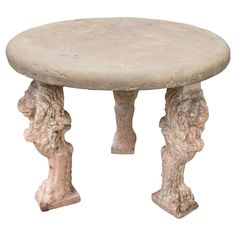 a stone table with two legs on it