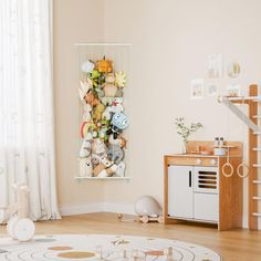 a child's play room with toys on the floor