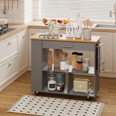 a kitchen island cart with spices and condiments on it