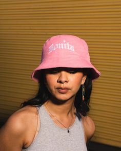 Our Pink Corduroy BONITA Bucket Hat features an embroidered logo on the front center panel. Pink Cotton Hat For Streetwear, Pink Cotton Hat With Embroidered Logo, Trendy Pink Hat With Embroidered Logo, Pink Hip Hop Snapback Hat, Pink Streetwear Hats With Embroidered Logo, Adjustable Pink Bucket Hat With Flat Brim, Pink Hat With Embroidered Logo For Streetwear, Pink Embroidered Logo Hat For Streetwear, Trendy Bucket Hat With Embroidered Logo