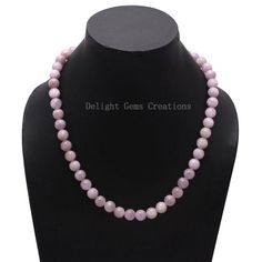 Product Details : Item Code : DGC2805Gemstone Name :  KUNZITEChain Style : BEADEDBeads Shape : SMOOTH ROUNDBeads Size :  9 MM ApproxLength : 18" Inch ApproxWeight : 270 Cts. ApproxCustomization : **Available**Please Feel Free To Contact If You Have Any Query. Adjustable Round Pearl Necklace With Gemstone Beads, Adjustable Pearl Necklace With Gemstone Beads, Elegant 8mm Round Beads For Gems And Cabochons, Round Pearl Necklace With Gemstone Beads For Gifts, Elegant 8mm Round Beads For Jewelry Making, Elegant Round Crystal Necklaces With 8mm Beads, Wedding Gemstone Beaded Necklaces, Wedding Beaded Necklaces With Round Natural Stones, Wedding Beaded Necklaces With Natural Round Stones