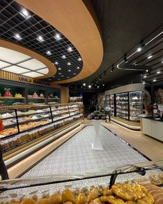 a bakery filled with lots of different types of pastries