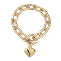 Embrace elegance with our Alana Puffy Heart Charm Bracelet, featuring a thick, rounded link chain secured by a toggle clasp with a charming 3D puffy heart. Specifications: Material: Recycled Brass Plating: Available in 14K Gold or Rhodium-Silver Protective Coating: Each chain is coated with a clear layer to prevent rapid wear and tarnishing. Charm Size: The solid puffy heart charm is 0.75 inches. Chain Dimensions: Links measure 20mm in length, 12mm in width, and 3mm in thickness. Available Lengt Puffy Heart Charms, Wrist Jewelry, 3d Heart, Puffy Heart, Demi Fine Jewelry, Anklet Bracelet, Jewelry Stand, Anklet Jewelry, Toggle Clasp