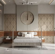 a bedroom with a bed, ceiling fan and large mirror on the wall above it