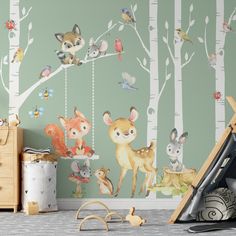 a child's room with woodland animals and trees