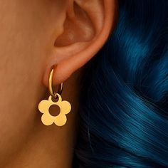 ✨ Flower Drop Earrings ✨  Embrace modern minimalism with our sleek Stainless Steel Earrings. Crafted with precision and style in mind, these earrings feature a unique design that adds a touch of contemporary elegance to any outfit. Make a bold statement with these versatile pieces of jewellery, perfect for both casual and formal occasions. Elevate your accessory game with these eye-catching earrings that effortlessly blend simplicity and sophistication.  ✨ FREE DELIVERY✨   ♥What's Included:  2x Steel Flowers, Dainty Earrings, Stainless Steel Earrings, Daisy Flower, Jewelry Earrings Hoops, Flower Earrings, Earring Gifts, Silver Fashion, Gold Earrings