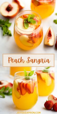 peach sangria with fresh fruit and mint garnish on the rim, served in glasses