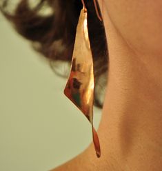 "These bronze earrings are hand-forged using the anticlastic raising technique. They are light, and perfect for everyday wear. The ear wires are 14K gold-filled - no worries about allergies. Approximately 3\" long." Copper Outfit, 2024 Jewelry, Bold Statement Jewelry, Jewellery Shop Design, Copper Jewellery, Metalsmithing Jewelry, Bronze Earrings, Earrings Elegant, Long Dangle Earrings