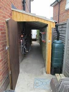 an alley way with a bike parked in it