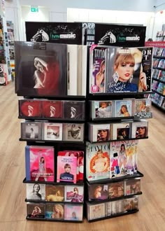 there are many cd's stacked on the floor in this store, and it looks like they were made out of cds