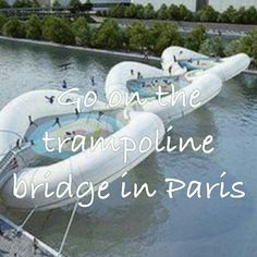 an inflatable raft floating on the water with people standing around it and text that reads go on the trampoline bridge in paris