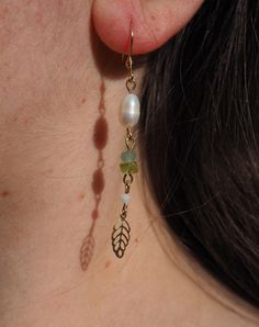 Leaf earrings with natural peridot and green jade, giving green academia and botanical vibes  Materials:  - Stainless Steel, gold plated stainless steel  - Natural Crystals: jade and peridot  - Natural pearls Feel free to message me if you have any questions :)  Love  Cathrine Vilain  Vilain Jewelry Crystals Jade, Green Academia, Peridot Crystal, Peridot Earrings, Botanical Jewelry, Leaf Jewelry, Green Jade, Leaf Earrings, Natural Pearls