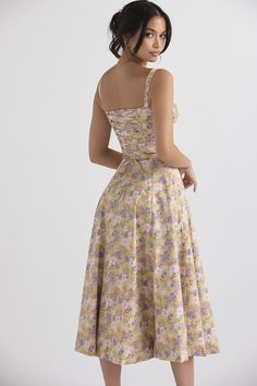 Features You'll feel super feminine in our Floral Print Sundress, perfect for summer garden parties. Cut from stretch cotton, it's printed with the prettiest green flowers and has a bodice design with a delicate lace back for an adjustable fit. The gathered bust is styled with drawstring ties, and side slits add a touch of flair. It's fully lined for comfort and has a zipper on the left side for easy on and off. Size Chart 🌸 US UK EU AU XS 2 6 34 6 S 4 8 36 8 M 6 10 38 10 L 8 12 40 12 Fitted Bodice Sundress For Garden Party, Midi Length, Floral Print Summer Midi Dress With Sweetheart Neckline, Summer Midi Dress With Sweetheart Neckline And Floral Print, Fitted Bodice Sundress For Summer Garden Party, Summer Sundress With Fitted Bodice For Garden Party, Summer Floral Print Midi Dress With Fitted Bodice, Cotton Sundress With Fitted Bodice, Cotton Dress With Fitted Bodice For Garden Party, Fitted Bodice Sundress For Garden Party