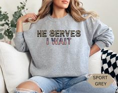 The He Serves, I Wait Sweatshirt is more than just a piece of clothing - it's a symbol of pride, strength, and unwavering support. Crafted with the softest materials and a comfortable fit, this sweatshirt is perfect for cozy evenings at home or showing solidarity at events. With a bold yet elegant design that features the simplicity of being the partner of an enlisted man, it serves as a reminder of the sacrifices and dedication that come with being a spouse to a brave member of the military. We May The Force Be With Us Shirt, Wife Sweatshirt, Army Wife Life, Air Force Military, Marines Girlfriend, Marine Wife, Military Girlfriend, Proud Wife, I Wait